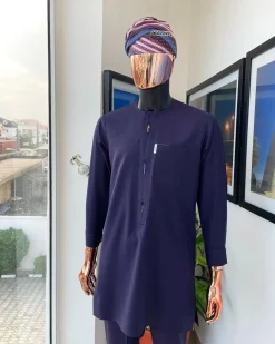 An eggplant purple flap with paisley lining details, African traditional senator kaftan native