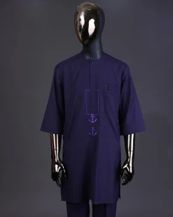 An eggplant purple, front flap with black Swarovski button, square and anchor embroidery detailing kaftan and Sokoto