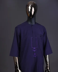 An eggplant purple, front flap with black Swarovski button, square and anchor embroidery detailing kaftan and Sokoto