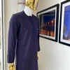 An eggplant purple “Suktan” shoulder drop embroidery and front flap, free suit hand sleeve details, African traditional senator native