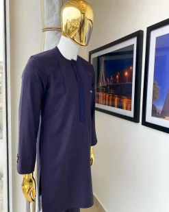 An eggplant purple “Suktan” shoulder drop embroidery and front flap, free suit hand sleeve details, African traditional senator native