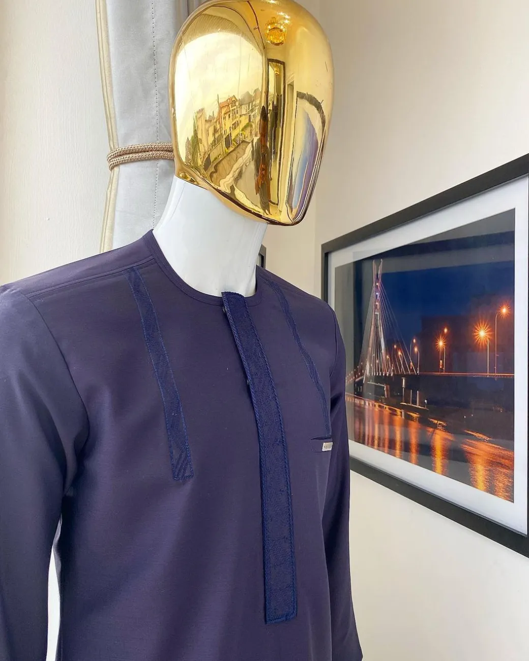An eggplant purple “Suktan” shoulder drop embroidery and front flap, free suit hand sleeve details, African traditional senator native
