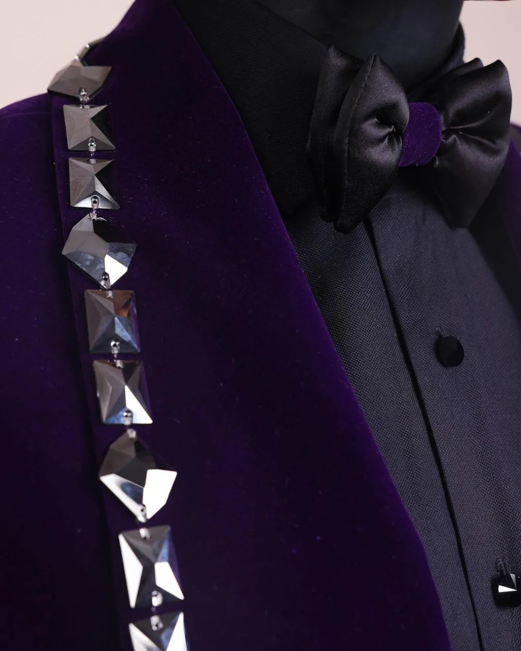 An Eggplant Purple Velvet Shawl Lapel Tuxedo Suit, laced with rectangle and octagonal jet hematite Swarovski stones