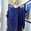 An eggplant purple, wavy level, zigzag embroidery agbada