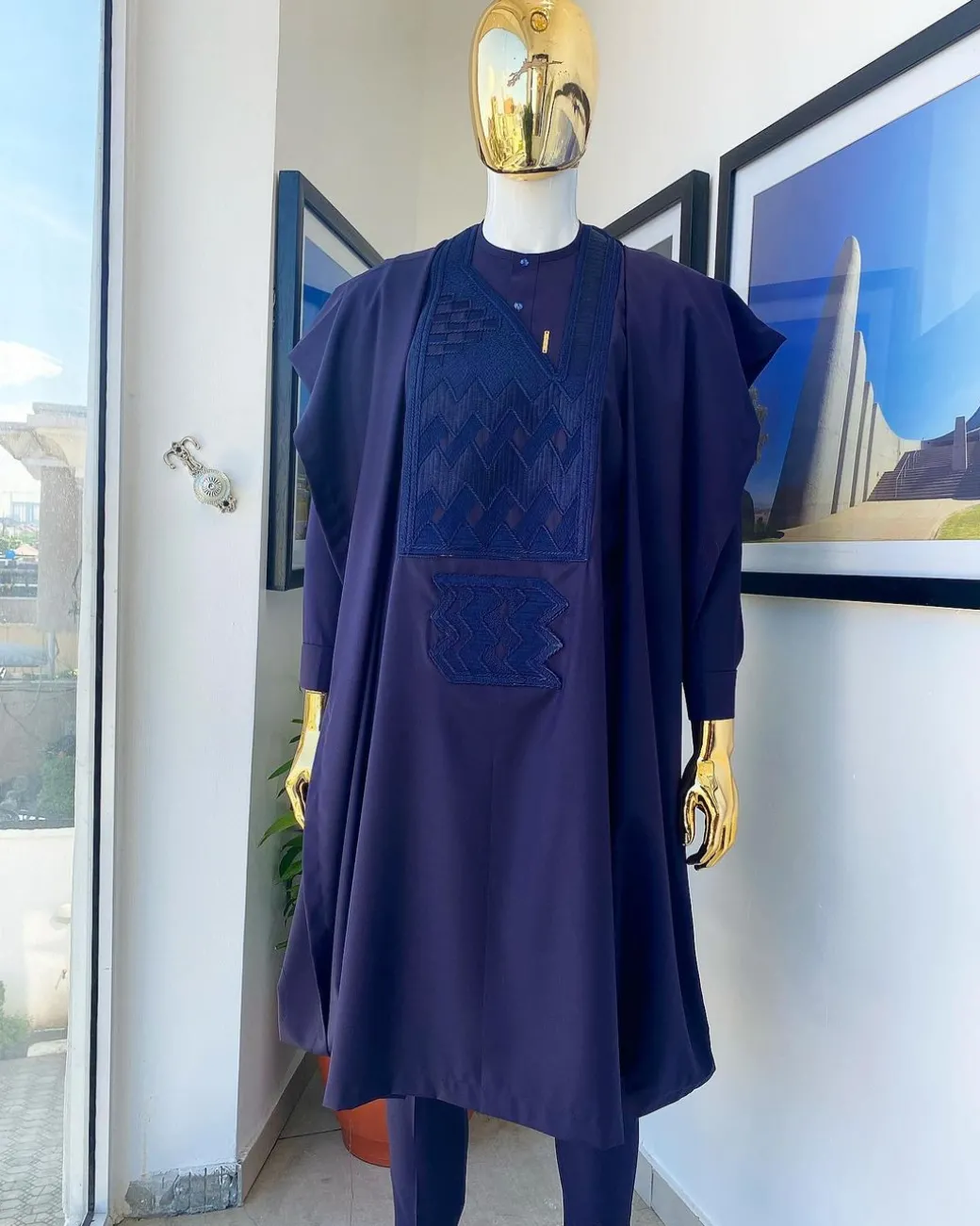 An eggplant purple, wavy level, zigzag embroidery agbada