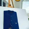 An Egyptian blue, front flap, patch pocket, matching Swarovski buttons, paisley detailing African senator kaftan native.