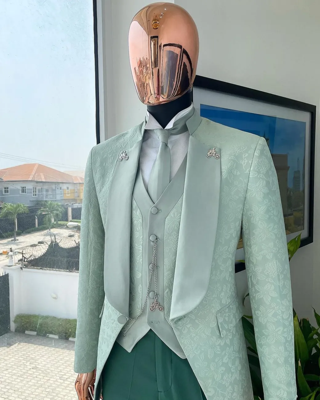 An “eloper” Pistachio green, floral pattern jacquard tuxedo suit
