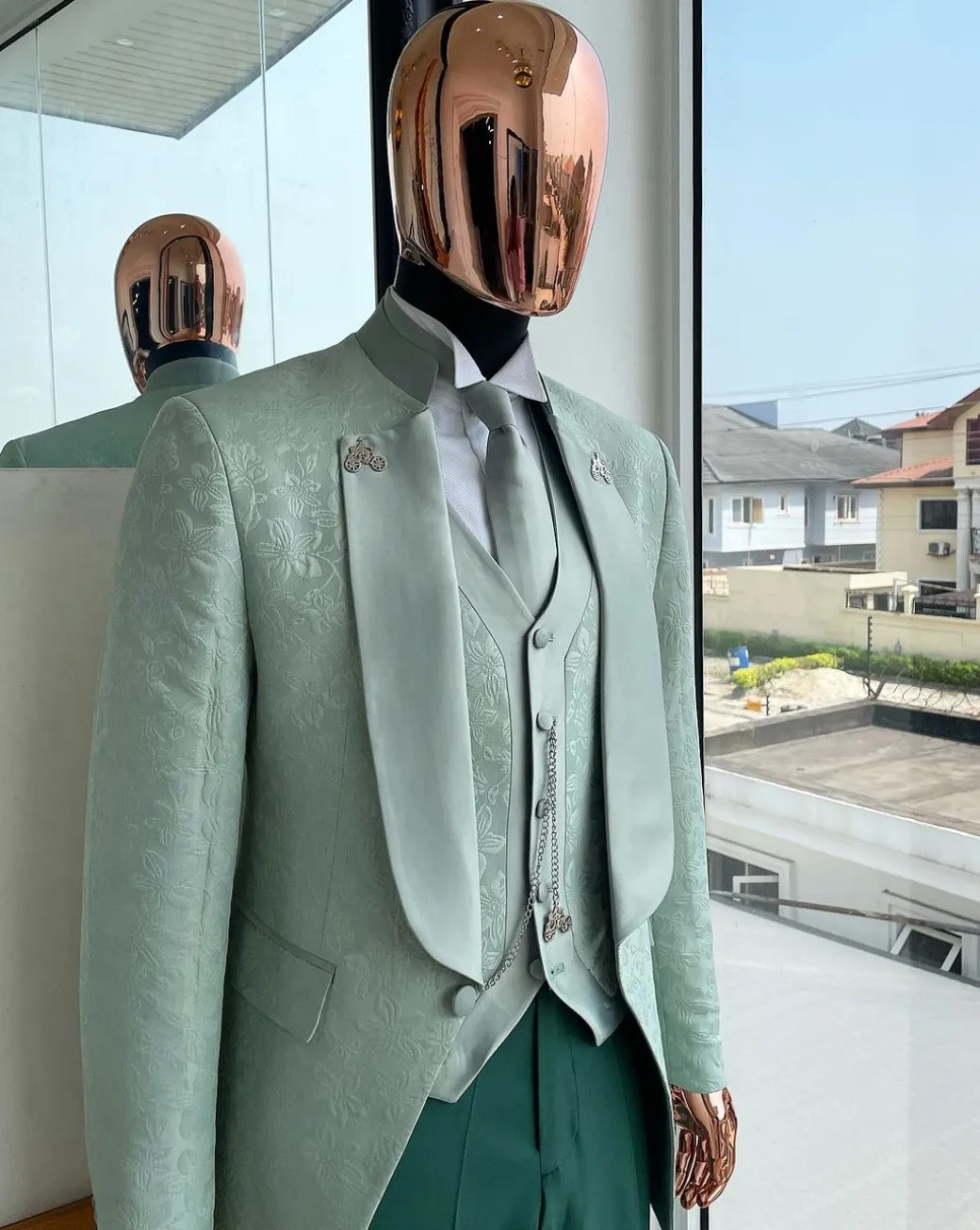 An “eloper” Pistachio green, floral pattern jacquard tuxedo suit