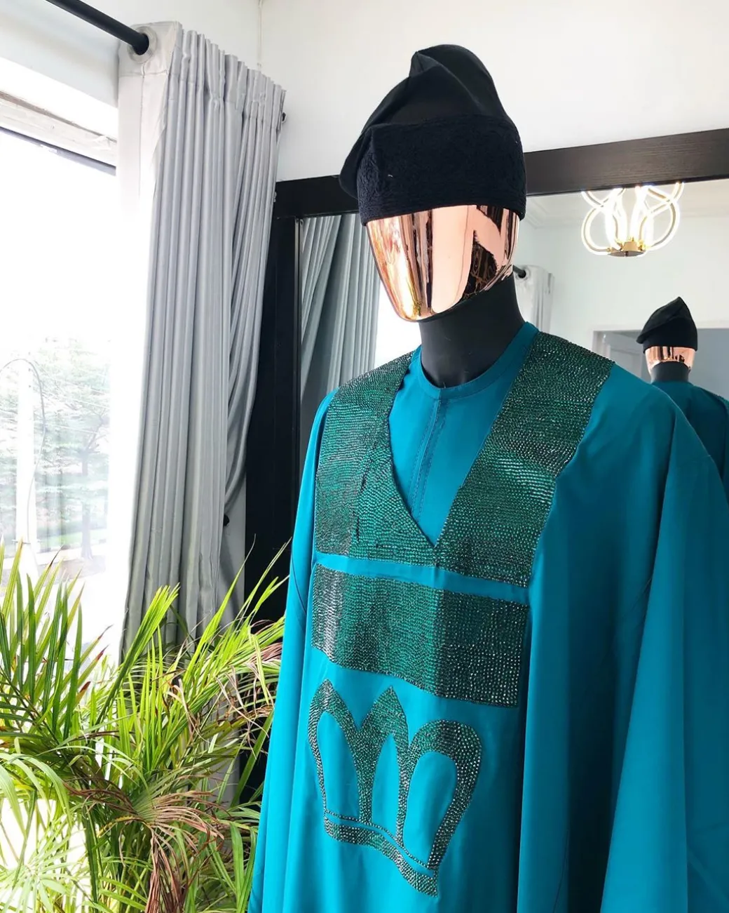 An Emerald Green Agbada with Swarovski Stone Embroidery