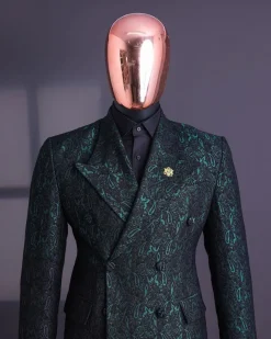 An Emerald green & black “rival” 1/4 cut ocean element peak lapel double breasted jacquard suit.