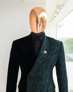 An Emerald green & black “rival” 1/4 cut ocean element peak lapel double breasted jacquard suit