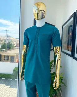 An emerald green embroidery detailing African traditional senator kaftan native