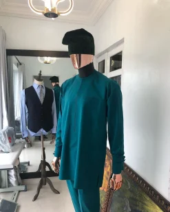 An Emerald Green front flap African senator Kaftan with hand woven velvet Egba Yoruba hat