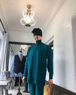 An Emerald Green front flap African senator Kaftan with hand woven velvet Egba Yoruba hat
