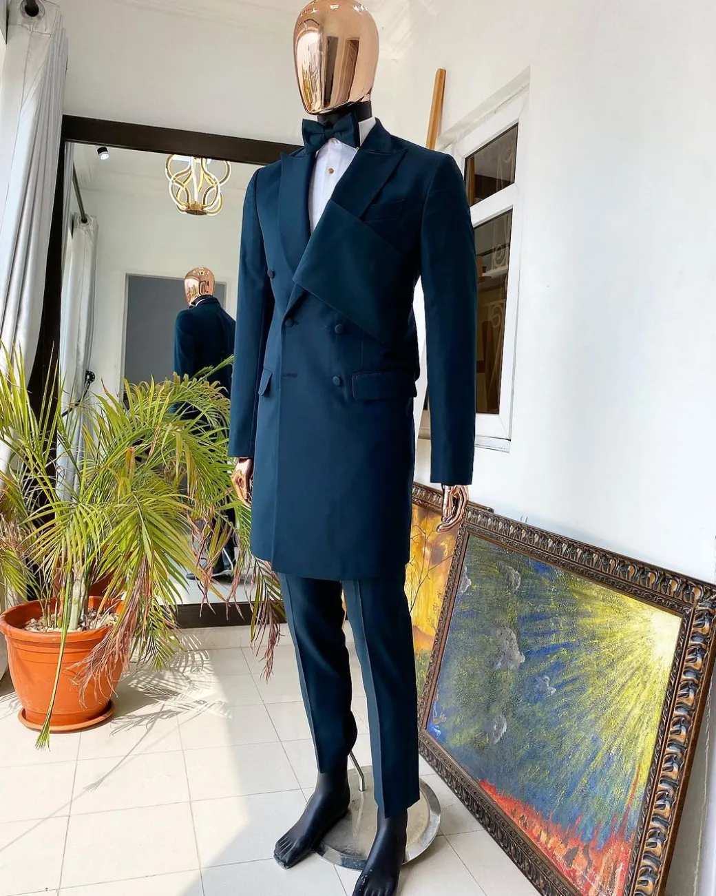 An Emerald green “Oranmiyan” trench blazer suit