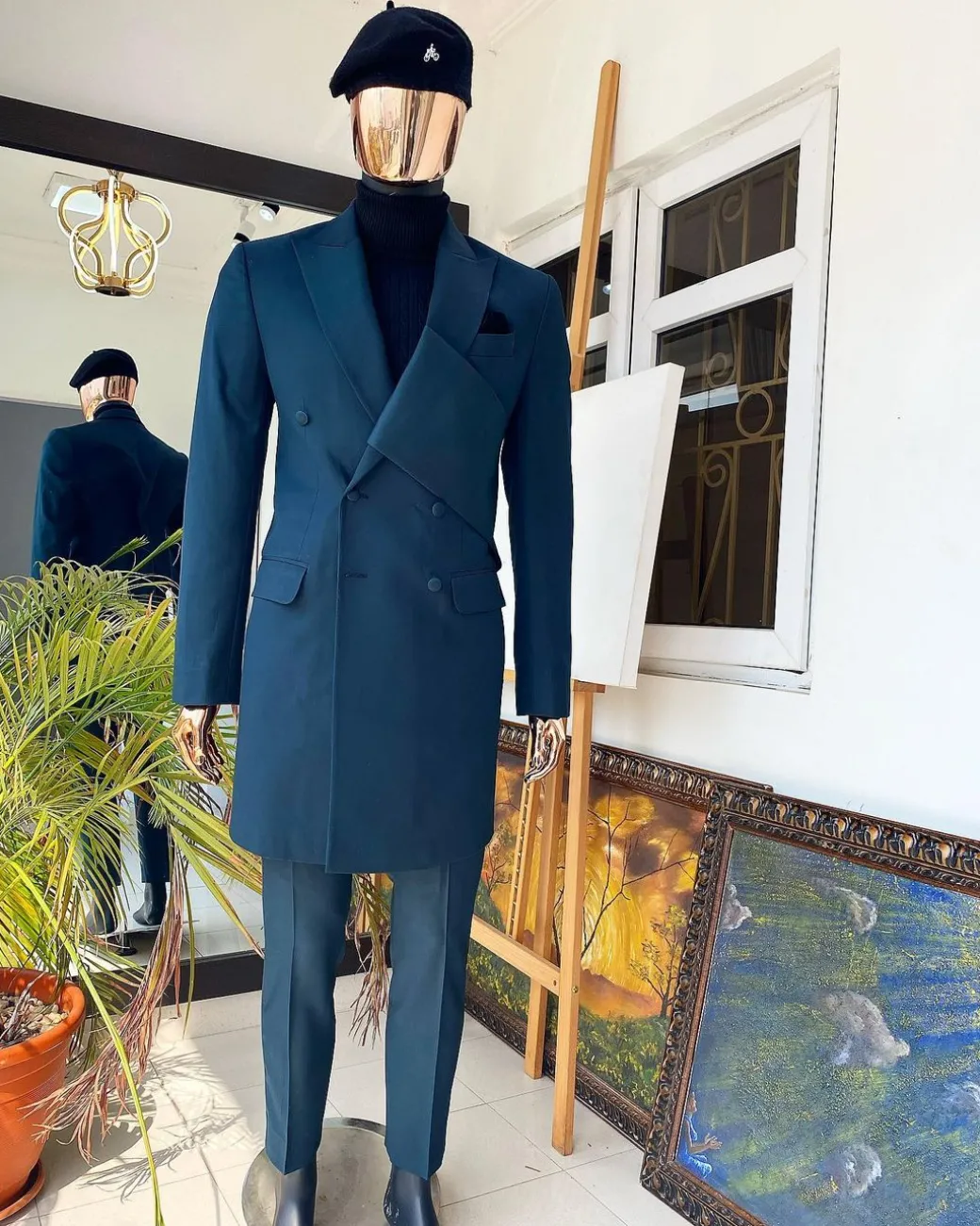 An Emerald green “Oranmiyan” trench suit