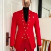 An “empire” candy red, floral patterned metallic jacquard suit