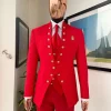An “Empire” candy red, floral patterned metallic jacquard suit
