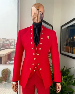 An “empire” candy red, floral patterned metallic jacquard suit