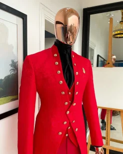 An “empire” candy red, floral patterned metallic jacquard suit