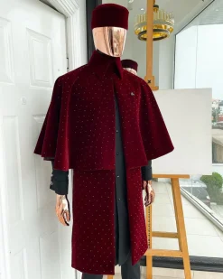 An “Eyes Wide Shut” mahogany red soaked Italian velvet Ceremonial suktan with black Swarovski stone detailing