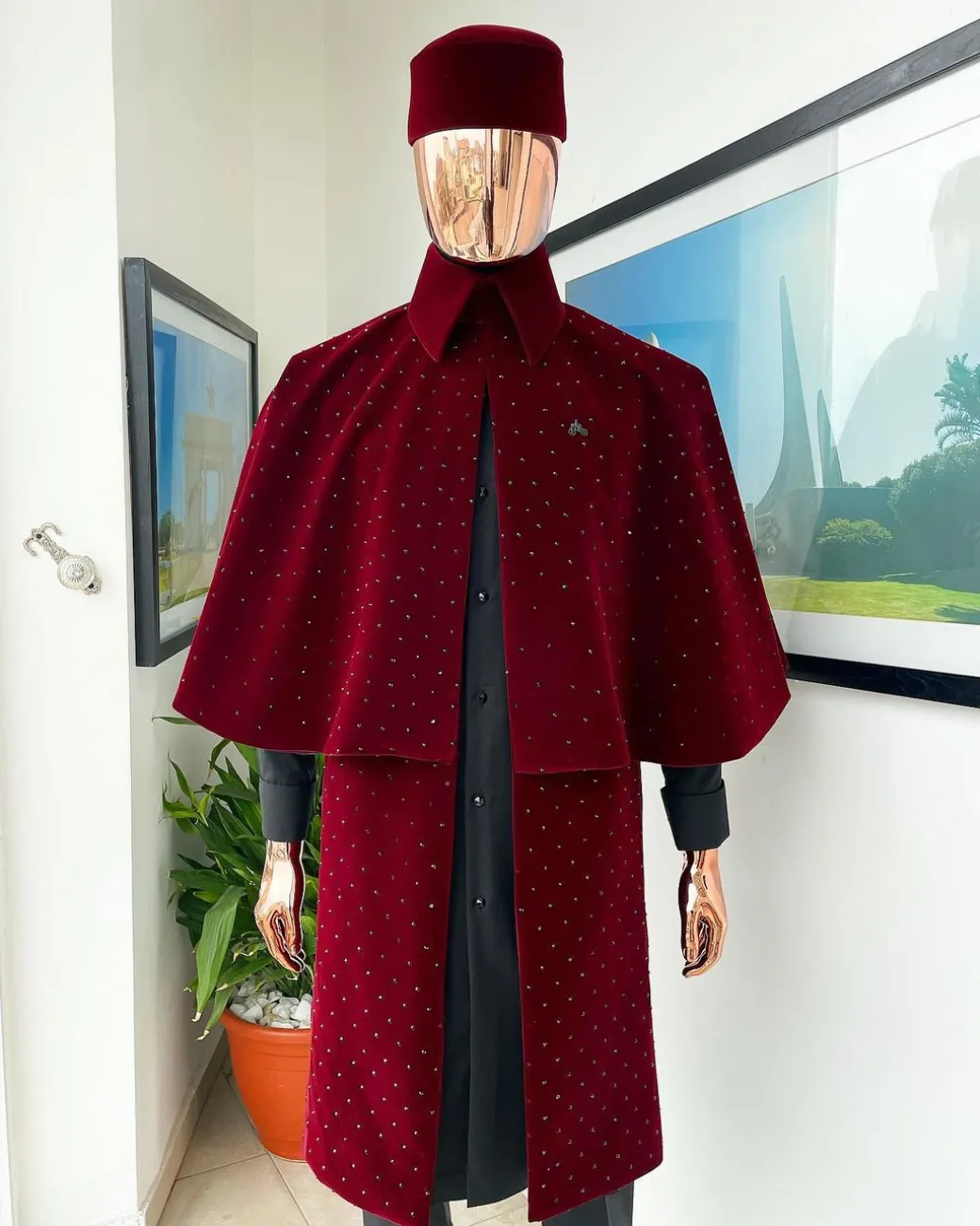 An “Eyes Wide Shut” mahogany red soaked Italian velvet Ceremonial suktan with black Swarovski stone detailing