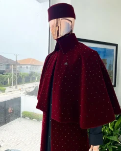An “Eyes Wide Shut” mahogany red soaked Italian velvet Ceremonial suktan with black Swarovski stone detailing