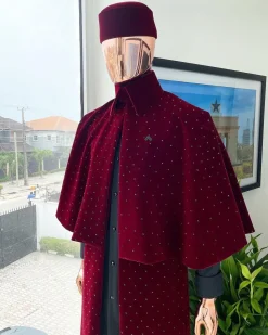 An “Eyes Wide Shut” mahogany red soaked Italian velvet Ceremonial suktan with black Swarovski stone detailing