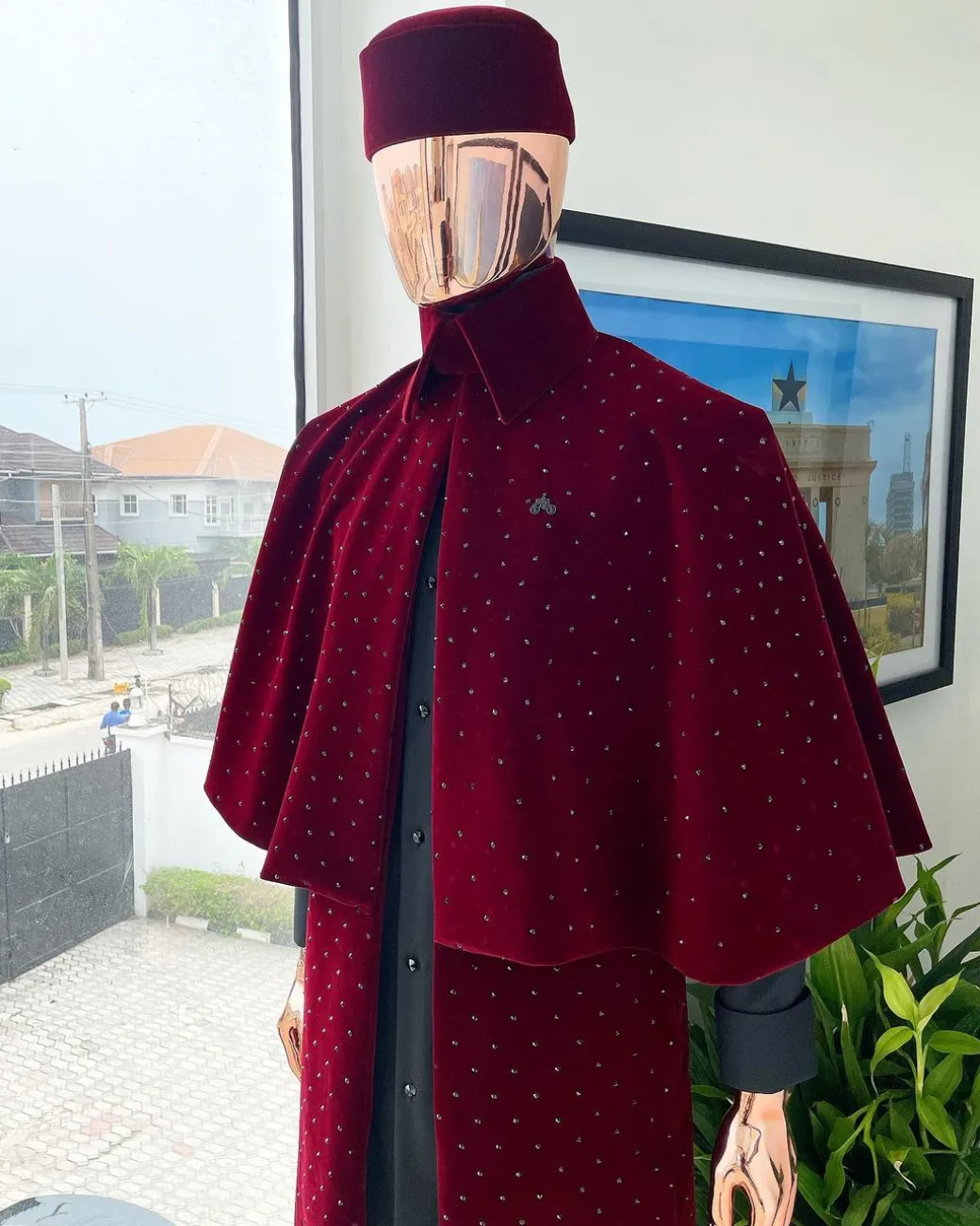 An “Eyes Wide Shut” mahogany red soaked Italian velvet Ceremonial suktan with black Swarovski stone detailing