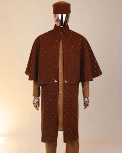 An “Eyes Wide Shut” syrup brown Italian velvet Ceremonial suktan with gold crystals Swarovski stone