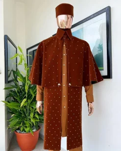 An “Eyes Wide Shut” syrup brown Italian velvet Ceremonial suktan with gold crystals Swarovski stone