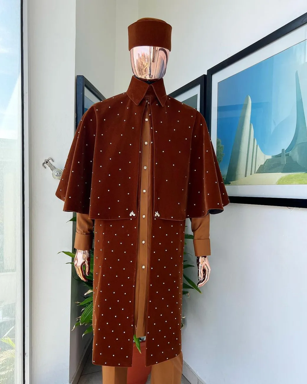 An “Eyes Wide Shut” syrup brown Italian velvet Ceremonial suktan with gold crystals Swarovski stone