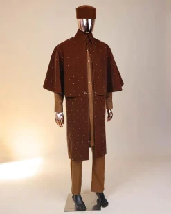 An “Eyes Wide Shut” syrup brown Italian velvet Ceremonial suktan with gold crystals Swarovski stone