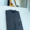 An invisible windowpane grey check, single pocket, front flap African traditional senator kaftan native.