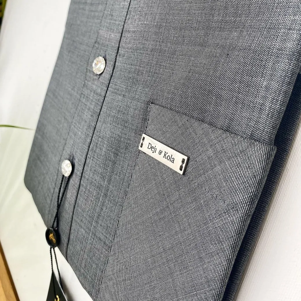 An Irish Grey African Kaftan with ABV diamond-shaped Australian Swarovski button