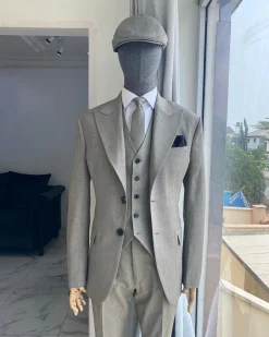 An Irish grey Bespoke reloaded “peaky blinders” Peak lapel suit