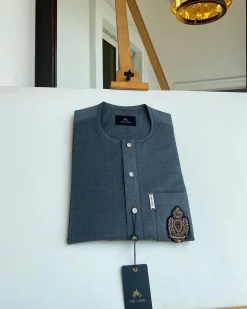 An Irish grey kaftan, button front flap, hand embroidery patch detailing, and a silver Swarovski African Kaftan and Sokoto