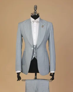 An Irish Maya blue, knitted peak lapel, patch pocket suit