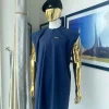An Irish navy blue dashiki, black beret and pant