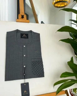 An Iron grey, front flap, and ruffle pockets with silver Swarovski button detail African traditional senator Kaftan native.