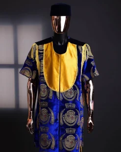 An “Isiagba” gold, blue with matching fringe details, short sleeve top & velvet pant African traditional native.