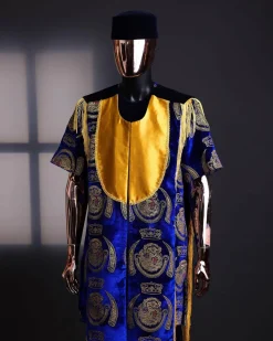 An “Isiagba” gold, blue with matching fringe details, short sleeve top & velvet pant African traditional native.