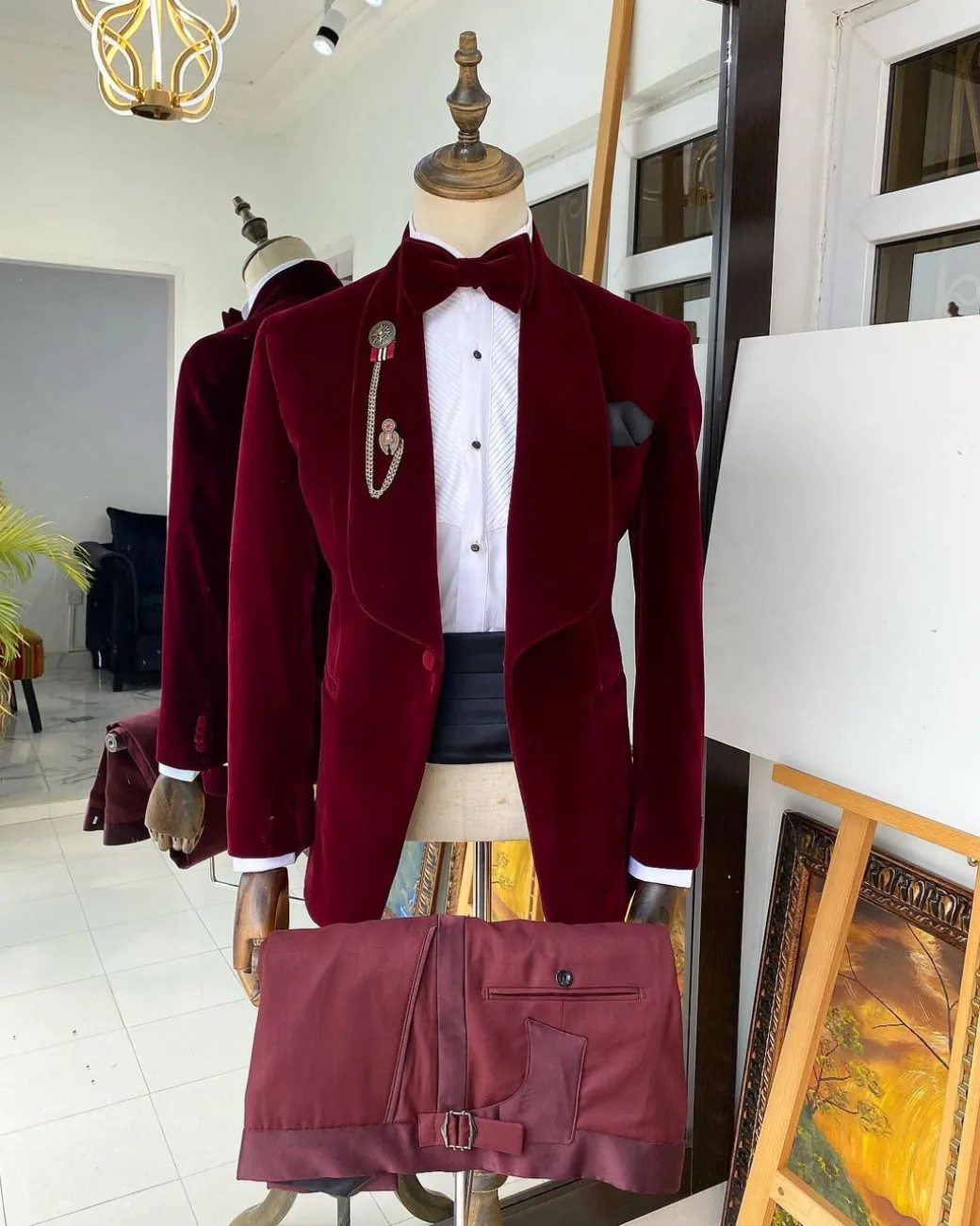 An Italian velvet burgundy Shawl lapel tuxedo suit