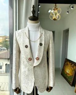 An Ivory Gold Patterned “From The Same Side” Shawl lapel Suit.