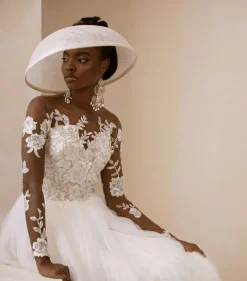 An Ivory Top Patterned Long Sleeve Tulle Wedding gown/dress