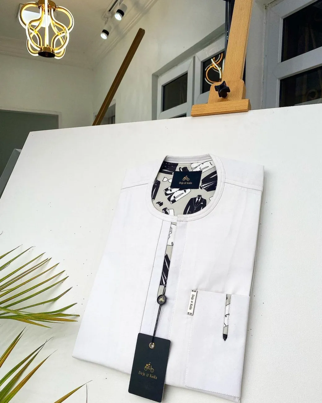 An Ivory white African Kaftan with paisley detailing and sokoto