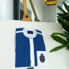 An Ivory white and blue check, black Swarovski buttons, front flap, Indian Hand embroidery badge details African traditional senator kaftan native.