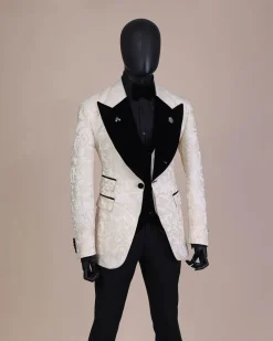 An Ivory white and Gold Floral patterned Peak lapel metallic jacquard tuxedo suit.