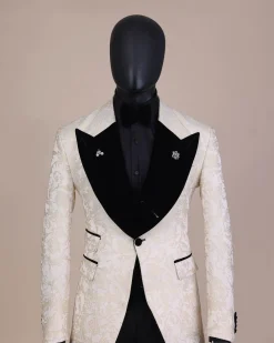 An Ivory white and Gold Floral patterned Peak lapel metallic jacquard tuxedo suit.
