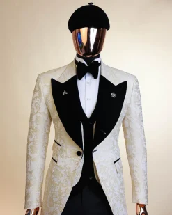 An Ivory white and Gold Floral patterned Peak lapel metallic jacquard tuxedo suit.
